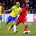 LE HAVRE, FRANCE - SEPTEMBER 23: Richarlison #9 of Brazil challenges Andre Ayew #10 of Ghana during the international friendly match between Brazil and Ghana at Stade Oceane on September 23, 2022 in Le Havre, France. (Photo by Catherine Steenkeste/Getty Images)