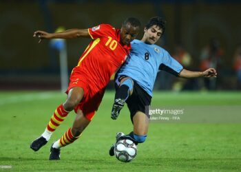 ISMAILIA, EGYPT - OCTOBER 02:  Andre Ayew of Ghana battles with Maximiliano Calzada of Uruguay during the Group D, FIFA U20 World Cup match between Uruguay and Ghana at the Ismailia Stadium on October 2, 2009 in Ismailia, Egypt.  (Photo by Julian Finney - FIFA/FIFA via Getty Images)