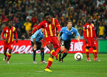 JOHANNESBURG, SOUTH AFRICA - JULY 02:  Asamoah Gyan of Ghana shoots a late penalty high during the 2010 FIFA World Cup South Africa Quarter Final match between Uruguay and Ghana at the Soccer City stadium on July 2, 2010 in Johannesburg, South Africa.  (Photo by Cameron Spencer/Getty Images)