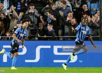 Club's Kamal Sowah (R) celebrates after scoring during a soccer game between Belgian Club Brugge KV and Spanish Atletico de Madrid, Tuesday 04 October 2022 in Brugge, on day 3/6 of the UEFA Champions League group stage. BELGA PHOTO BRUNO FAHY (Photo by BRUNO FAHY / BELGA MAG / Belga via AFP) (Photo by BRUNO FAHY/BELGA MAG/AFP via Getty Images)