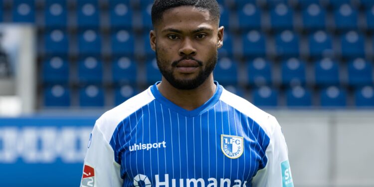 MAGDEBURG, GERMANY - JULY 08: Moritz-Broni Kwarteng of 1. FC Magdeburg poses during the team presentation at MDCC-Arena on July 8, 2022 in Magdeburg, Germany. (Photo by Ronny Hartmann/Getty Images)