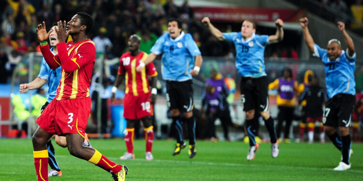 JOHANNESBURG, SOUTH AFRICA - JULY 02:  Asamoah Gyan of Ghana reacts as he misses a late penalty kick in extra time to win the match during the 2010 FIFA World Cup South Africa Quarter Final match between Uruguay and Ghana at the Soccer City stadium on July 2, 2010 in Johannesburg, South Africa.  (Photo by Clive Mason/Getty Images)