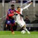 CLERMONT-FERRAND, FRANCE - APRIL 09: Alidu Seidu of Clermont Foot (L) fights for the ball with Kylian Mbappe of Paris Saint Germain (R) during the Ligue 1 Uber Eats match between Clermont Foot and Paris Saint Germain at Stade Gabriel Montpied on April 9, 2022 in Clermont-Ferrand, France. (Photo by Marcio Machado/Eurasia Sport Images/Getty Images)