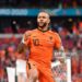 AMSTERDAM, NETHERLANDS - JUNE 17: Memphis Depay of Netherlands celebrates after scoring their side's first goal during the UEFA Euro 2020 Championship Group C match between the Netherlands and Austria at Johan Cruijff Arena on June 17, 2021 in Amsterdam, Netherlands. (Photo by Olaf Kraak - Pool/Getty Images)