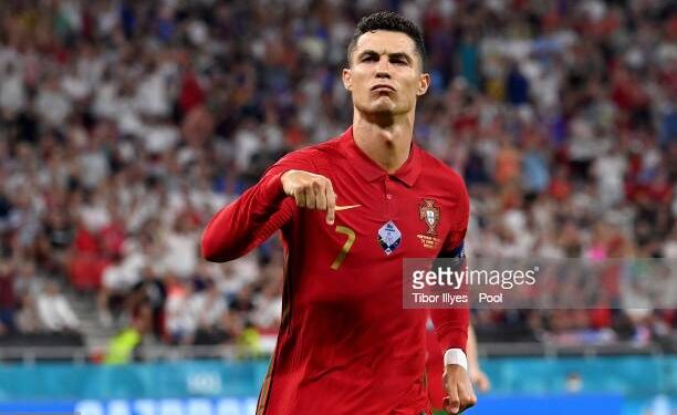 BUDAPEST, HUNGARY - JUNE 23: Cristiano Ronaldo of Portugal celebrates after scoring their side's first goal during the UEFA Euro 2020 Championship Group F match between Portugal and France at Puskas Arena on June 23, 2021 in Budapest, Hungary. (Photo by Tibor Illyes - Pool/Getty Images)
