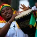 A Ghanaian fan plays a traditional drum prior to the World Cup group H football match between South Korea and Ghana, at the Education City Stadium in Qatar, Monday, November 28, 2022. [Julio Cortez/AP Photo]