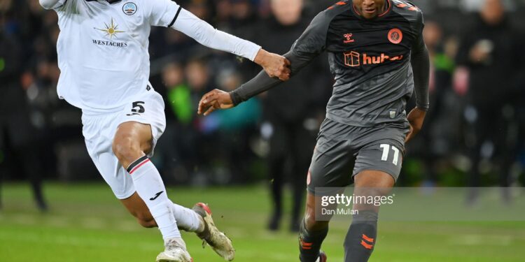 SWANSEA, WALES - JANUARY 17: Antoine Semenyo of Bristol City battles for possession with Ben Cabango of Swansea City during the Emirates FA Cup Third Round Replay match between Swansea City and Bristol City at Swansea.com Stadium on January 17, 2023 in Swansea, Wales. (Photo by Dan Mullan/Getty Images)