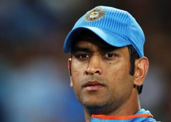AUCKLAND, NEW ZEALAND - MARCH 14: MS Dhoni of India looks on during the 2015 ICC Cricket World Cup match between India and Zimbabwe at Eden Park on March 14, 2015 in Auckland, New Zealand. (Photo by Anthony Au-Yeung-ICC/ICC via Getty Images)