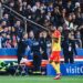 RC Lens midfielder Abdul Salis Samed leaves the pitch after being red carded following a harsh tackle on PSG star Achraf Hakimi