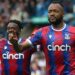Jeffery Schlupp joins Jordan Ayew in celebrating his second goal against Leeds United