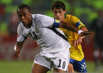 CAIRO, EGYPT - OCTOBER 16:  Andre Ayew of Ghana beats Giuliano of Brazil during the FIFA U20 World Cup Final between Ghana and Brazil at the Cairo International Stadium on October 16, 2009 in Cairo, Egypt.  (Photo by Alex Livesey - FIFA/FIFA via Getty Images)