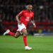 NOTTINGHAM, ENGLAND - MARCH 17: Andre Ayew of Nottingham Forest in action during the Premier League match between Nottingham Forest and Newcastle United at City Ground on March 17, 2023 in Nottingham, England. (Photo by Laurence Griffiths/Getty Images)