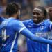 Genk's Ghanaian midfielder Joseph Paintsil (C) celebrates with Genk's Belgian midfielder Mike Tresor Ndayishimiye (L) after scoring his teams fifth goal during the Belgian Pro League football match between KRC Genk and RSC Anderlecht in Genk on April 16, 2023. (Photo by VIRGINIE LEFOUR / Belga / AFP) / Belgium OUT (Photo by VIRGINIE LEFOUR/Belga/AFP via Getty Images)