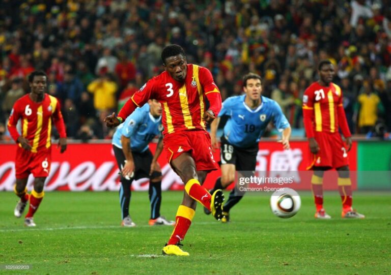 JOHANNESBURG, SOUTH AFRICA - JULY 02:  Asamoah Gyan of Ghana shoots a late penalty high during the 2010 FIFA World Cup South Africa Quarter Final match between Uruguay and Ghana at the Soccer City stadium on July 2, 2010 in Johannesburg, South Africa.  (Photo by Cameron Spencer/Getty Images)