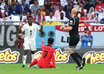 AL RAYYAN, QATAR - NOVEMBER 28: Tariq Lamptey of Ghana reacts as the Referee Anthony Taylor of England awards a free kick against him for a foul on Son Heung-min of South Korea during the FIFA World Cup Qatar 2022 Group H match between Korea Republic and Ghana at Education City Stadium on November 28, 2022 in Al Rayyan, Qatar. (Photo by Youssef Loulidi/Fantasista/Getty Images)