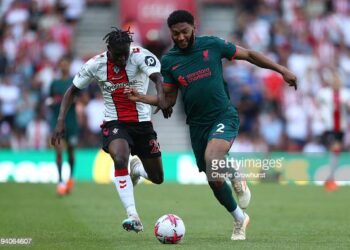 SOUTHAMPTON, ENGLAND - MAY 28: Kamaldeen Sulemana of Southampton battles for the ball with Liverpool's Joe Gomez during the Premier League match between Southampton FC and Liverpool FC at Friends Provident St. Mary's Stadium on May 28, 2023 in Southampton, England. (Photo by Charlie Crowhurst/Getty Images)