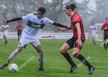 EDITORIAL USE ONLY No use with unauthorised audio, video, data, fixture lists, club/league logos or "live" services. Online in-match use limited to 120 images, no video emulation. No use in betting, games or single club/league/player publications.
Mandatory Credit: Photo by PHIL MINGO/PPAUK/Shutterstock (12813193ek)
Freddie Issaka of Plymouth Argyle U18 holds off  Archie Harris of AFC Bournemouth U18s during the EFL Youth Alliance, South West Division Match between AFC Bournemouth U18s and Plymouth Argyle U18s at Canford Arena, Bournemouth on 19 February 2022. Photo: Phil Mingo/PPAUK
Bournemouth u18 v Plymouth Argyle u18, Youth Alliance League football, Bournemouth, UK - 19 Feb 2022