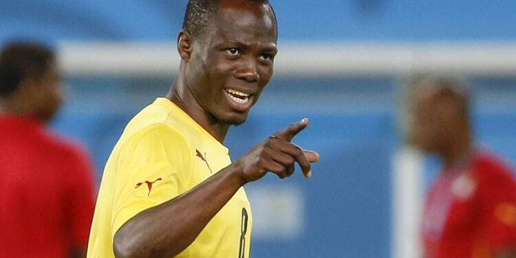 Jun 15, 2014; Natal, Rio Grande do Norte, BRAZIL; Ghana midfielder Emmanuel Agyemang Badu (8) points to a teammate during practice in preparation for their opening World Cup game against the United States at Estadio das Dunas. Mandatory Credit: Winslow Townson-USA TODAY Sports