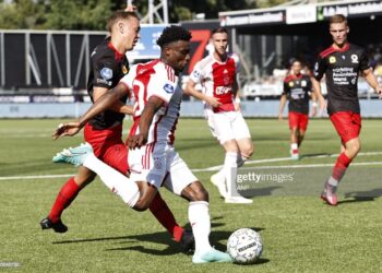 ROTTERDAM - (lr) Julian Baas of sbv Excelsior, Mohammed Kudus of Ajax during the Dutch premier league match between Excelsior and Ajax at Van Donge & De Roo Stadium on August 19, 2023 in Rotterdam, Netherlands. ANP MAURICE VAN STONE (Photo by ANP via Getty Images)