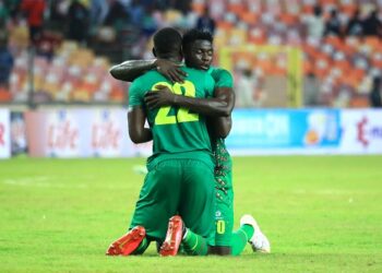Opa Sangante of Guinea-Bissau and Mane Manconi Soriano of Guinea-Bissau celebrate beating Nigeria 1-0 during the 2023 Africa Cup of Nations Qualifying match between Nigeria and Guinea-Bissau held at the Abuja National Stadium in Abuja, Nigeria on 24 March 2023 ©Justina Aniefiok/BackpagePix