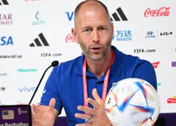 USA's coach #00 Gregg Berhalter speaks during a press conference at the Qatar National Convention Center (QNCC) in Doha on December 2, 2022, on the eve of the Qatar 2022 World Cup football match between the Netherlands and USA. (Photo by Patrick T. Fallon / AFP) (Photo by PATRICK T. FALLON/AFP via Getty Images)