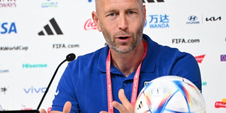 USA's coach #00 Gregg Berhalter speaks during a press conference at the Qatar National Convention Center (QNCC) in Doha on December 2, 2022, on the eve of the Qatar 2022 World Cup football match between the Netherlands and USA. (Photo by Patrick T. Fallon / AFP) (Photo by PATRICK T. FALLON/AFP via Getty Images)