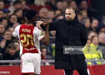AMSTERDAM - (lr) Mohammed Kudus of Ajax, Ajax coach John Heitinga during the Dutch premier league match between Ajax Amsterdam and RKC Waalwijk at the Johan Cruijff ArenA on February 12, 2023 in Amsterdam, Netherlands. ANP MAURICE VAN STONE (Photo by ANP via Getty Images)