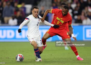 NASHVILLE, TENNESSEE - OCTOBER 17: Sergiño Dest #2 of the United States battles for the ball with Jordan Ayew #9 of Ghana during the second half during an international friendly at GEODIS Park on October 17, 2023 in Nashville, Tennessee. (Photo by John Dorton/ISI Photos/USSF/Getty Images for USSF)