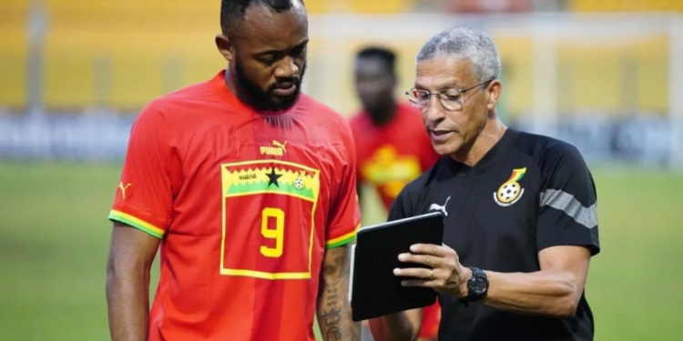 Ghana forward Jordan Ayew being tutored by Black Stars manager Chris Hughton during an AFCON qualification game at the Baba Yara Stadium