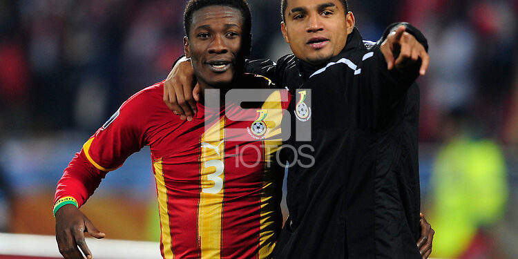 Asamoah Gyan of Ghana celebrates at the final whistle with Kevin Prince Boateng. Ghana defeated the USA 2-1 in overtime in the 2010 FIFA World Cup at Royal Bafokeng Stadium in Rustenburg, South Africa on June 26, 2010.