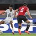 Ghana's forward #25 Antoine Semenyo fights for the ball with Egypt's defender #6 Ahmed Hegazy during the Africa Cup of Nations (CAN) 2024 group B football match between Egypt and Ghana at the Felix Houphouet-Boigny Stadium in Abidjan on January 18, 2024. (Photo by Issouf SANOGO / AFP) (Photo by ISSOUF SANOGO/AFP via Getty Images)