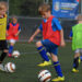 WHETSTONE, ENGLAND - OCTOBER 03:  Boys and girls taking part in the FA Skills training session at Holmes Park on October 3, 2014 in Whetstone, England.  (Photo by Tony Marshall - The FA/The FA via Getty Images)