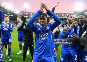 WATFORD, ENGLAND - FEBRUARY 10: Abdul Fatawu of Leicester City applauds the travelling Leicester City fans after the Sky Bet Championship match between Watford and Leicester City at Vicarage Road on February 10, 2024 in Watford, United Kingdom. (Photo by Plumb Images/Leicester City FC via Getty Images)