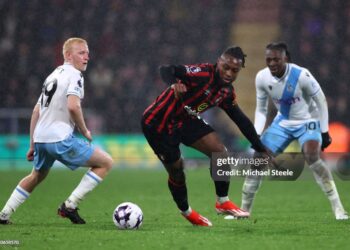 BOURNEMOUTH, ENGLAND - APRIL 02: Antoine Semenyo of AFC Bournemouth is challenged by Will Hughes and Eberechi Eze of Crystal Palace during the Premier League match between AFC Bournemouth and Crystal Palace at the Vitality Stadium on April 02, 2024 in Bournemouth, England. (Photo by Michael Steele/Getty Images)