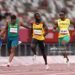 TOKYO, JAPAN - JULY 31: Benjamin Azamati-Kwaku (2R) of Team Ghana reacts towards Yohan Blake of Team Jamaica during their Men's 100m Round 1 heats on day eight of the Tokyo 2020 Olympic Games at Olympic Stadium on July 31, 2021 in Tokyo, Japan. (Photo by Cameron Spencer/Getty Images)