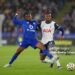 Leicester City's Abdul Fatawu Issahaku (left) challenges Tottenham Hotspur's Destiny Udogie (right) during the Premier League match at the King Power Stadium, Leicester. Picture date: Monday August 19, 2024. (Photo by Bradley Collyer/PA Images via Getty Images)