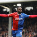 LONDON, ENGLAND - APRIL 27: Jeffrey Schlupp of Crystal Palace celebrates scoring his team's first goal during the Premier League match between Fulham FC and Crystal Palace at Craven Cottage on April 27, 2024 in London, England. (Photo by Ryan Pierse/Getty Images)