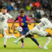 Lamine Yamal right wingerof Barcelona and Spain and Mohammed Salisu centre-back of Monaco and Ghana compete for the ball during the Joan Gmaper Trophy match between FC Barcelona and AS Monaco at Estadi Olimpic Lluis Companys on August 12, 2024 in Barcelona, Spain. (Photo by Jose Breton/Pics Action/NurPhoto via Getty Images)