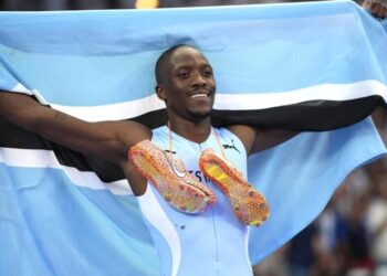 Botswana’s Letsile Tebogo celebrates after winning the men’s 200-meter final at the Paris 2024 Olympics in Saint-Denis on Thursday. | Photo Credit: AP