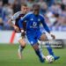 LEICESTER, ENGLAND - AUGUST 31: Abdul Fatawu of Leicester City is challenged by Lucas Digne of Aston Villa during the Premier League match between Leicester City FC and Aston Villa FC at The King Power Stadium on August 31, 2024 in Leicester, England. (Photo by Joe Prior/Visionhaus via Getty Images)