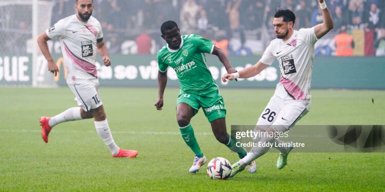 Himad ABDELLI of Angers and Augustine BOAKYE of Saint Etienne and Florent HANIN of Angers during the Ligue 1 MCDonald's match between Angers and Saint Etienne at Stade Raymond Kopa on October 26, 2024 in Angers, France. (Photo by Eddy Lemaistre/Icon Sport via Getty Images)