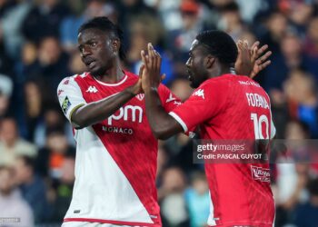 Monaco's French midfielder #19 Youssouf Fofana (R) celebrates with teammate Monaco's Ghanaian defender #22 Mohammed Salisu (L) after scoring his team's second goal during the French L1 football match between Montpellier Herault SC and AS Monaco at Stade de la Mosson in Montpellier, southern France, on May 12, 2024. (Photo by Pascal GUYOT / AFP) (Photo by PASCAL GUYOT/AFP via Getty Images)