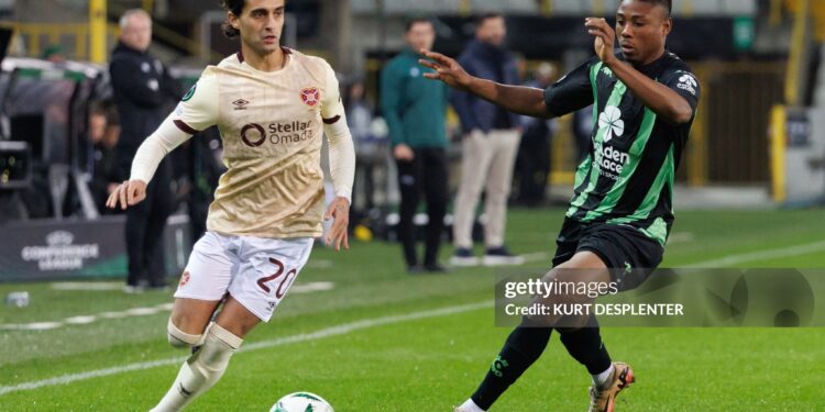 Hearts' Yan Dhanda and Cercle's Abu Francis fight for the ball during a soccer game between Belgian Cercle Brugge KSV and Scottish Heart of Midlothian FC, Thursday 28 November 2024 in Brugge, on day four of the League phase of the UEFA Conference League. BELGA PHOTO KURT DESPLENTER (Photo by KURT DESPLENTER / BELGA MAG / Belga via AFP) (Photo by KURT DESPLENTER/BELGA MAG/AFP via Getty Images)