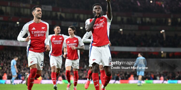 LONDON, ENGLAND - NOVEMBER 23: Thomas Partey of Arsenal celebrates scoring his team's second goal during the Premier League match between Arsenal FC and Nottingham Forest FC at Emirates Stadium on November 23, 2024 in London, England. (Photo by Stuart MacFarlane/Arsenal FC via Getty Images)