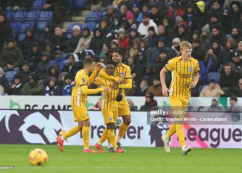 LEICESTER, ENGLAND - DECEMBER 8:  Brighton & Hove Albion's Tariq Lamptey (2nd from left) celebrates scoring the opening goal during the Premier League match between Leicester City FC and Brighton & Hove Albion FC at The King Power Stadium on December 8, 2024 in Leicester, England. (Photo by Stephen White - CameraSport via Getty Images)