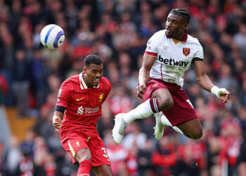 LIVERPOOL, ENGLAND - APRIL 13: Ryan Gravenberch of Liverpool and Mohammed Kudus of West Ham United during the Premier League match between Liverpool FC and West Ham United FC at Anfield on April 13, 2025 in Liverpool, England. (Photo by Ed Sykes/Sportsphoto/Allstar via Getty Images)