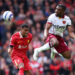 LIVERPOOL, ENGLAND - APRIL 13: Ryan Gravenberch of Liverpool and Mohammed Kudus of West Ham United during the Premier League match between Liverpool FC and West Ham United FC at Anfield on April 13, 2025 in Liverpool, England. (Photo by Ed Sykes/Sportsphoto/Allstar via Getty Images)