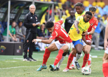PRETORIA, SOUTH AFRICA - APRIL 19:  Marwan Attia of Al Ahly SC and Teboho Mokoena of Mamelodi Sundowns FC during the 1st Leg of the CAF Champions League semi final match between Mamelodi Sundowns and Al Ahly FC at Loftus Stadium on April 19, 2025 in Pretoria, South Africa. (Photo by Lefty Shivambu/Gallo Images)