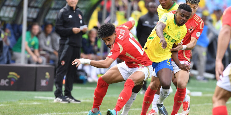PRETORIA, SOUTH AFRICA - APRIL 19:  Marwan Attia of Al Ahly SC and Teboho Mokoena of Mamelodi Sundowns FC during the 1st Leg of the CAF Champions League semi final match between Mamelodi Sundowns and Al Ahly FC at Loftus Stadium on April 19, 2025 in Pretoria, South Africa. (Photo by Lefty Shivambu/Gallo Images)