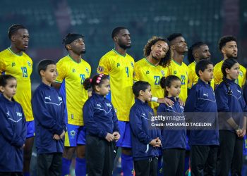 Gabon national team players during the national anthem before the match between Cameroon vs Gabon in the African Cup of Nations 2025 - Group F at Grand Stade D'Agadir , Agadir, Morocco (Photo by Mohamed Tageldin / Middle East Images / AFP via Getty Images)